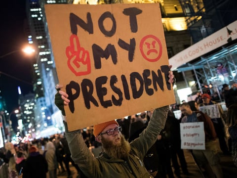 Anti-Donald Trump protesters march in the street on Fifth Avenue in New York City Friday, in another night of protests over the president-elect.